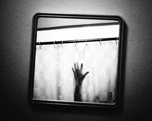 Photograph Andreas Kauppi Hand on One Eyeland